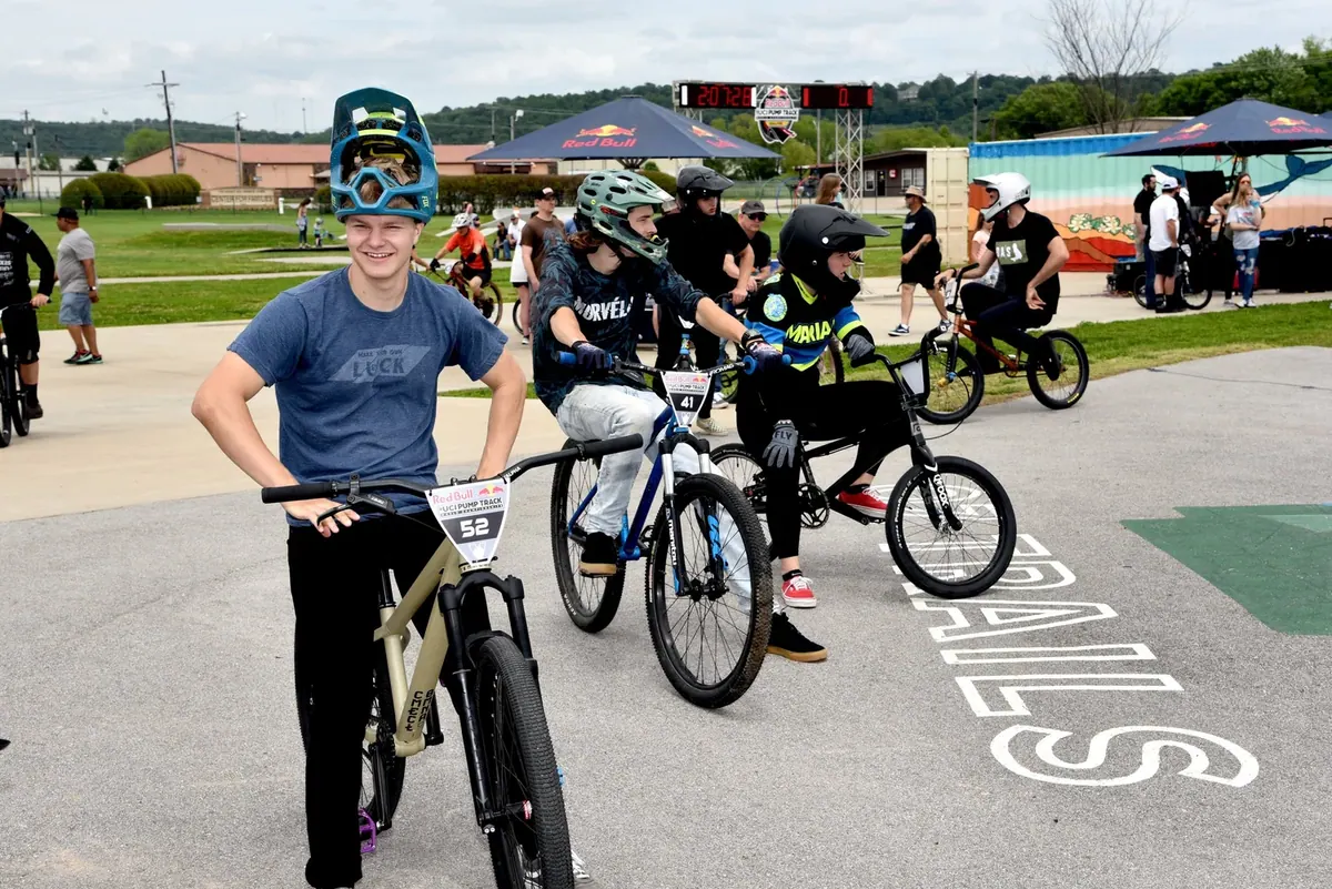 Young riders gathered with their bikes at a Springdale bike park