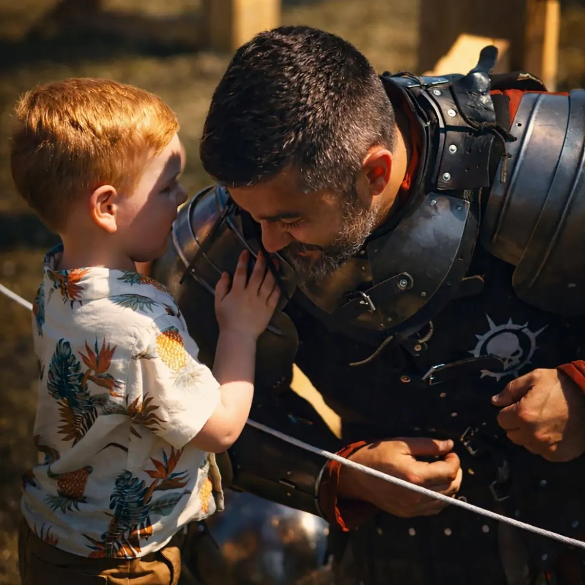Young child greeting an armored knight