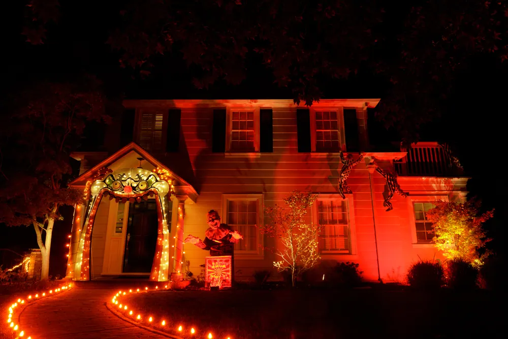 House decorated for Halloween with Large Jack in the Box and Ora