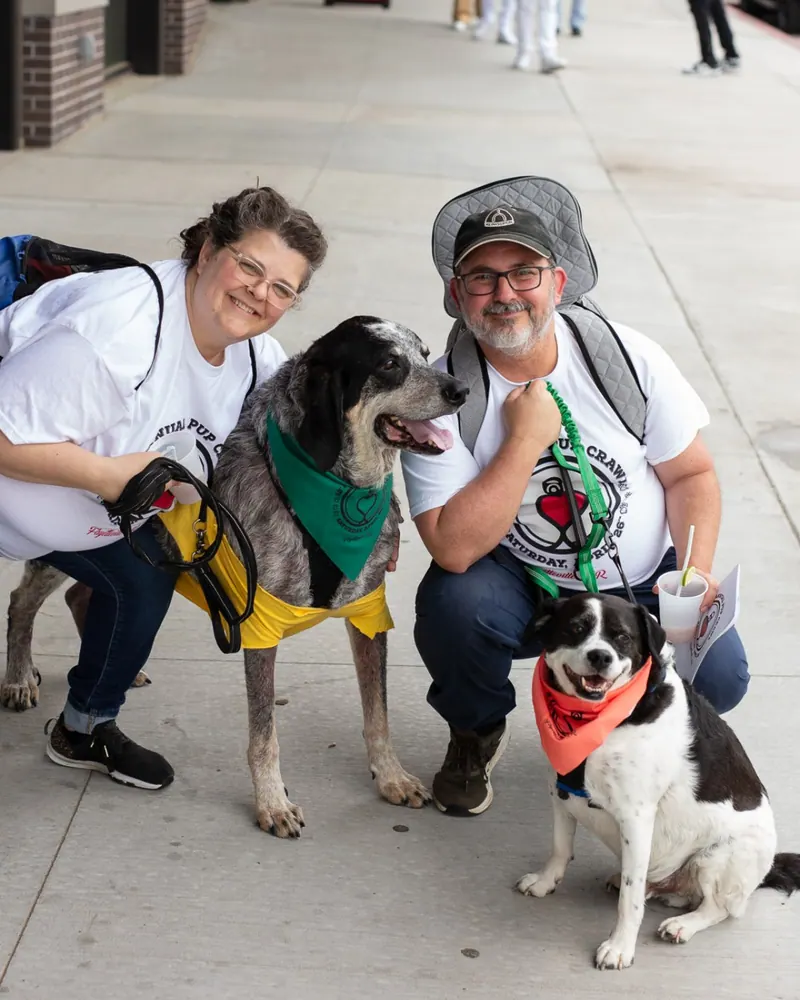 Dogs and Their People Take Over Dickson Street for the 13th Annual Pup Crawl in Fayetteville